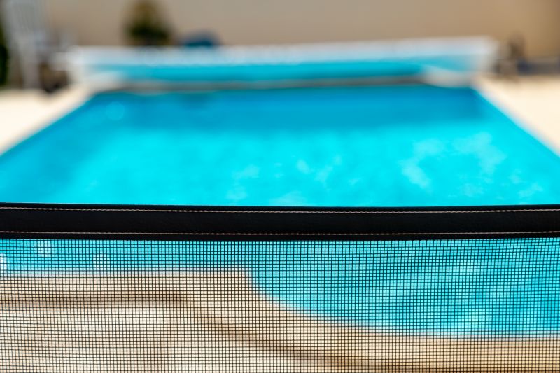 Pool with Mesh Safety Barrier